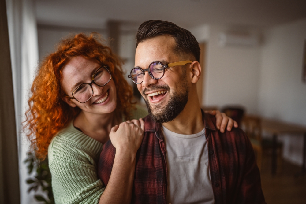 Portrait,Of,Adult,Hugged,Couple,Smile,At,Home,Happy,Together